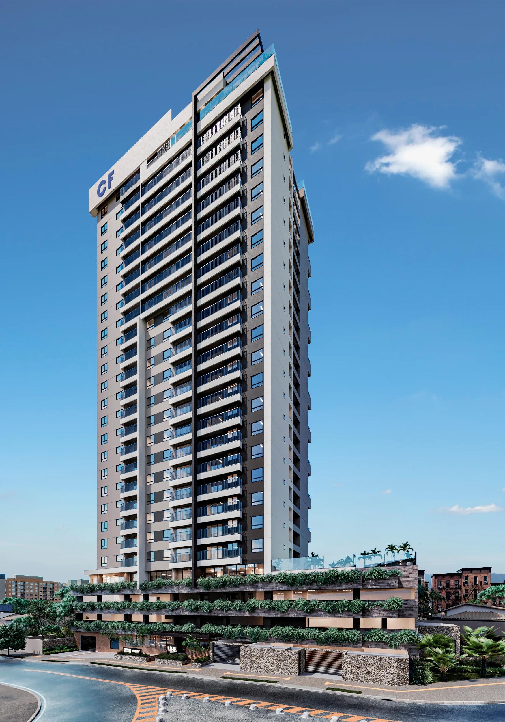 Fachada do edifício residencial de torre única com embasamento verde e céu azul