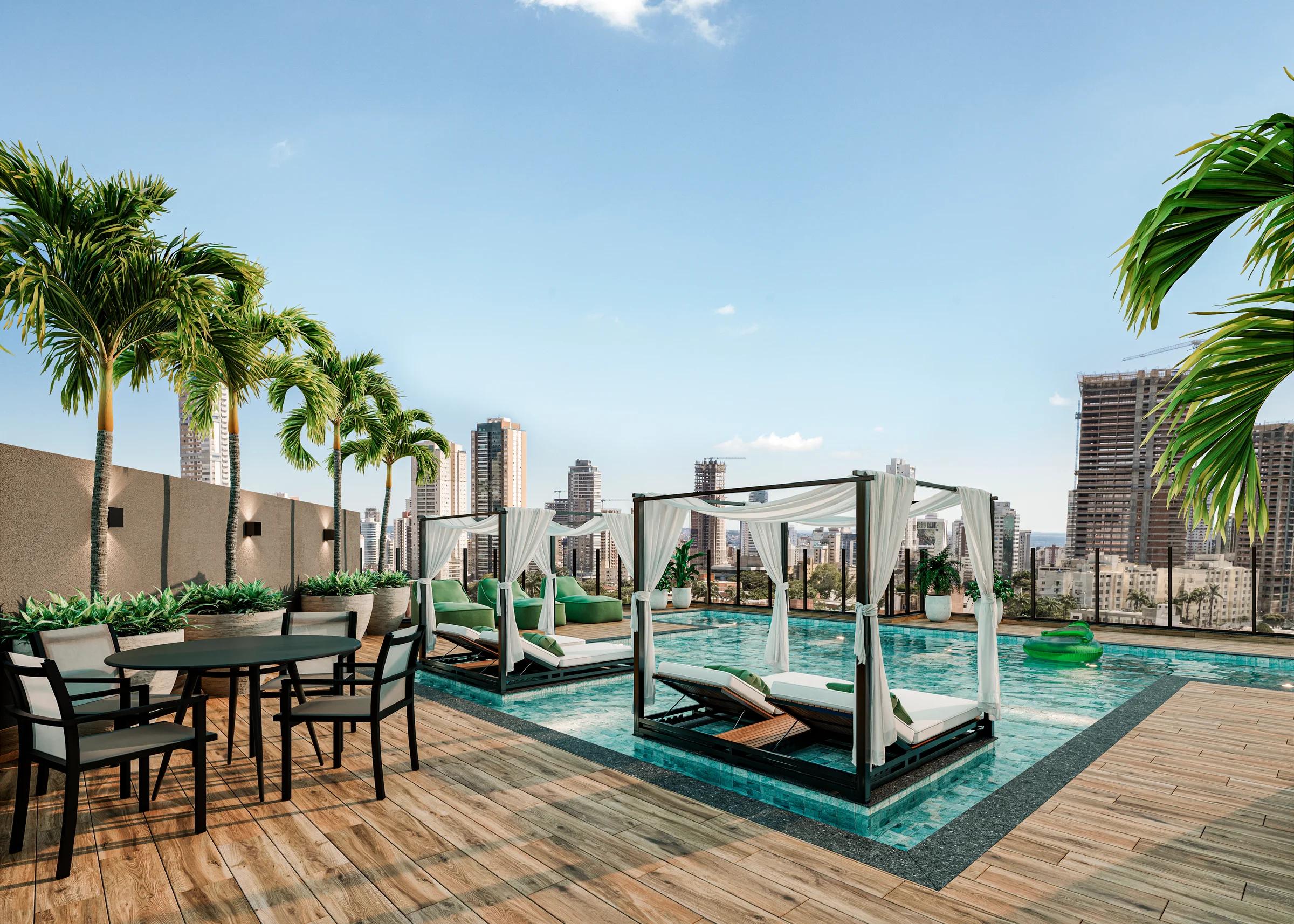 Piscina na cobertura com gazebos molhados, espreguiçadeiras e vista da cidade