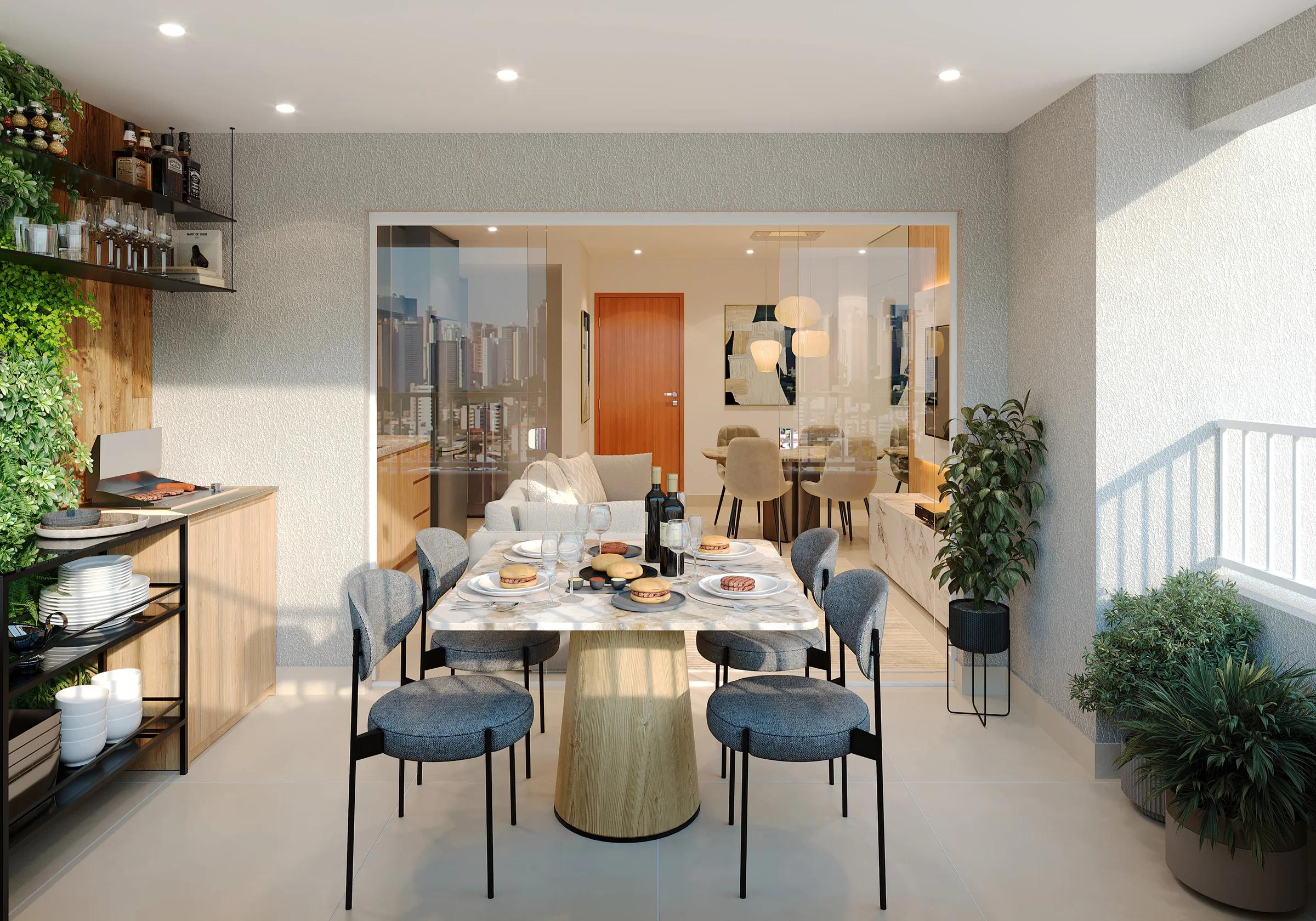 Varanda com mesa de jantar e bancada gourmet do apartamento de 76m² integrada à área interna