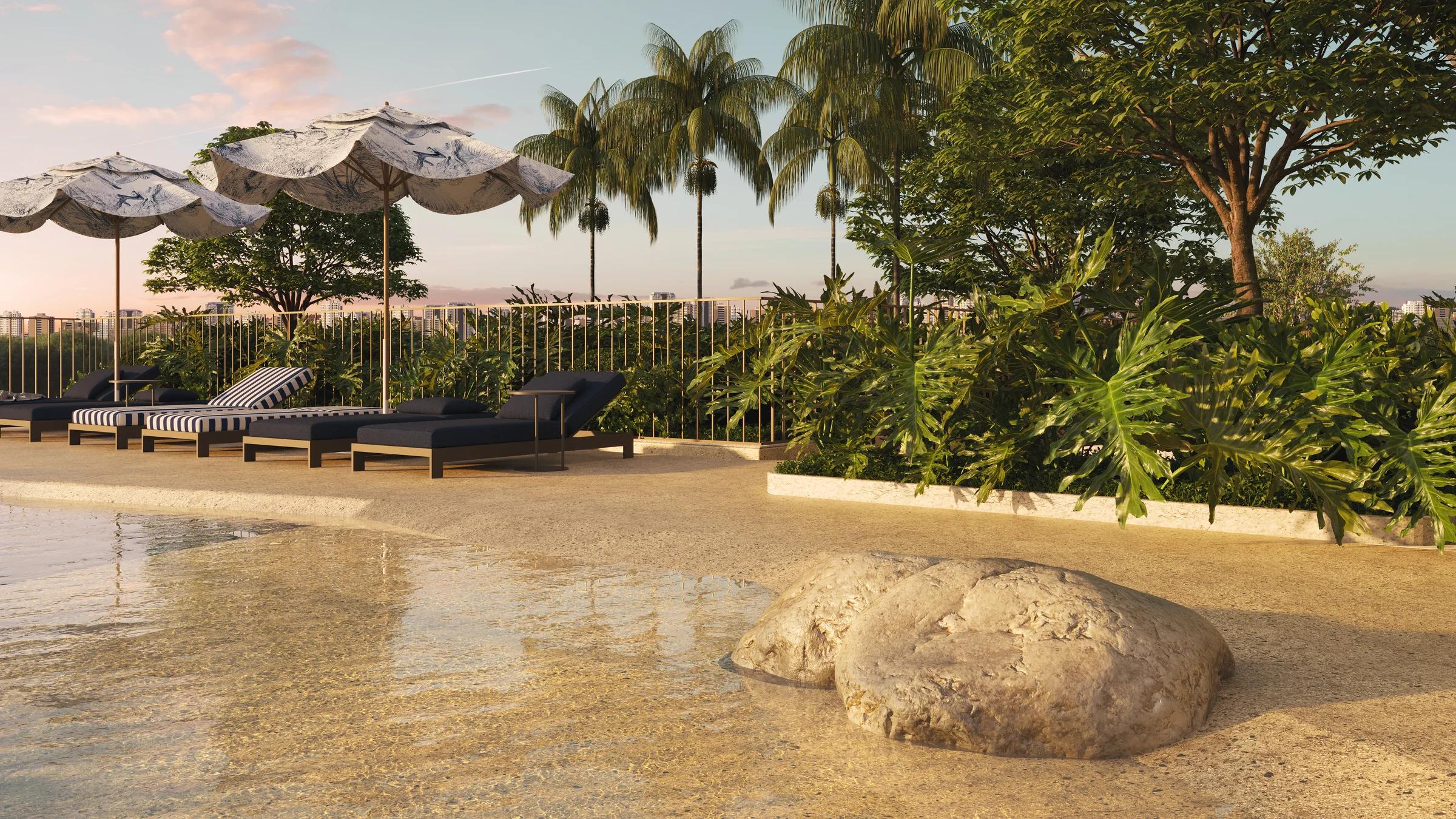 Deck da piscina com espreguiçadeiras sob ombrelones estampados e vegetação tropical