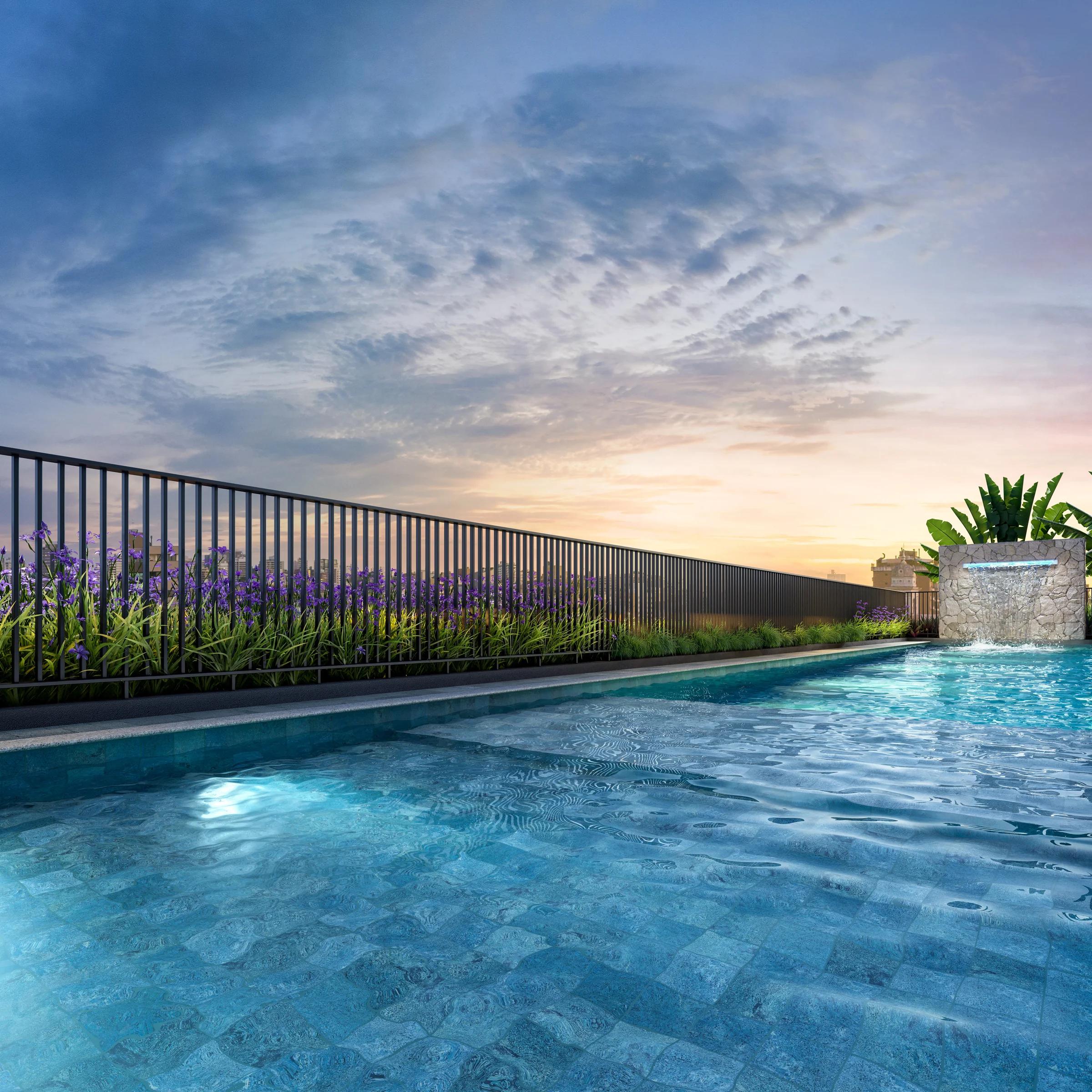 Piscina com borda infinita ao entardecer