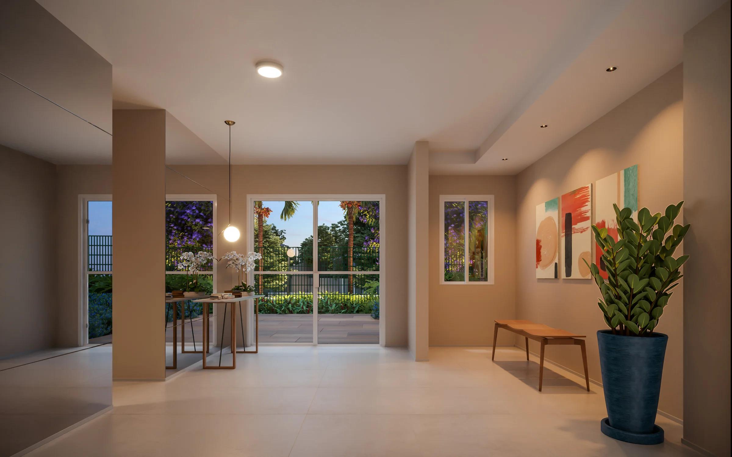 Lobby social decorado com banco de madeira, quadros e vista para o jardim