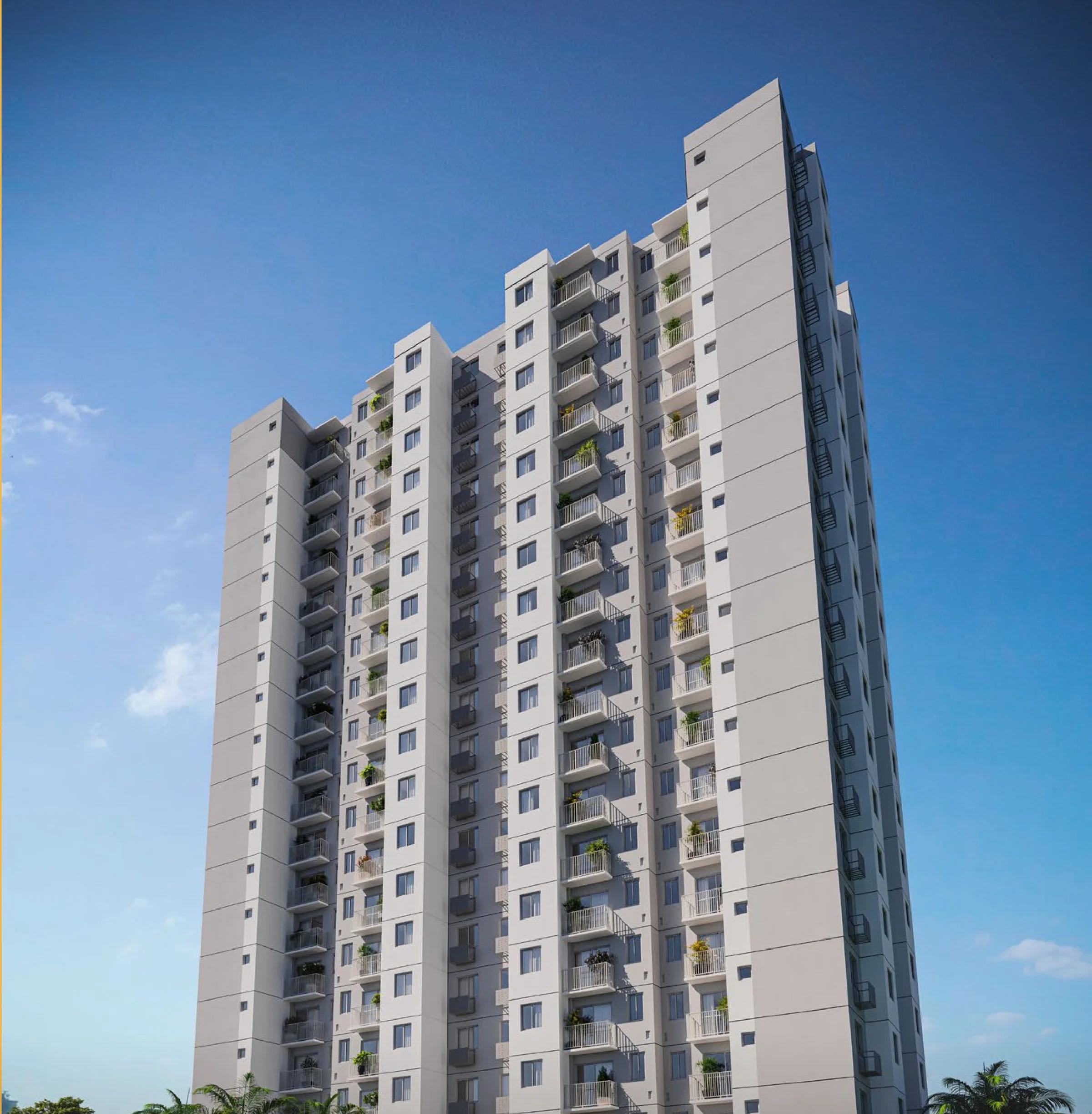 Perspectiva da fachada da torre residencial em ângulo vertical contra céu azul