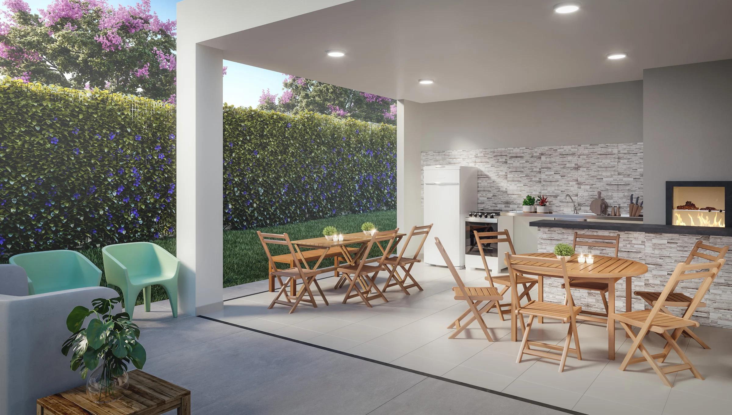 Vida Milão - Espaço gourmet com churrasqueira e mesas junto ao jardim