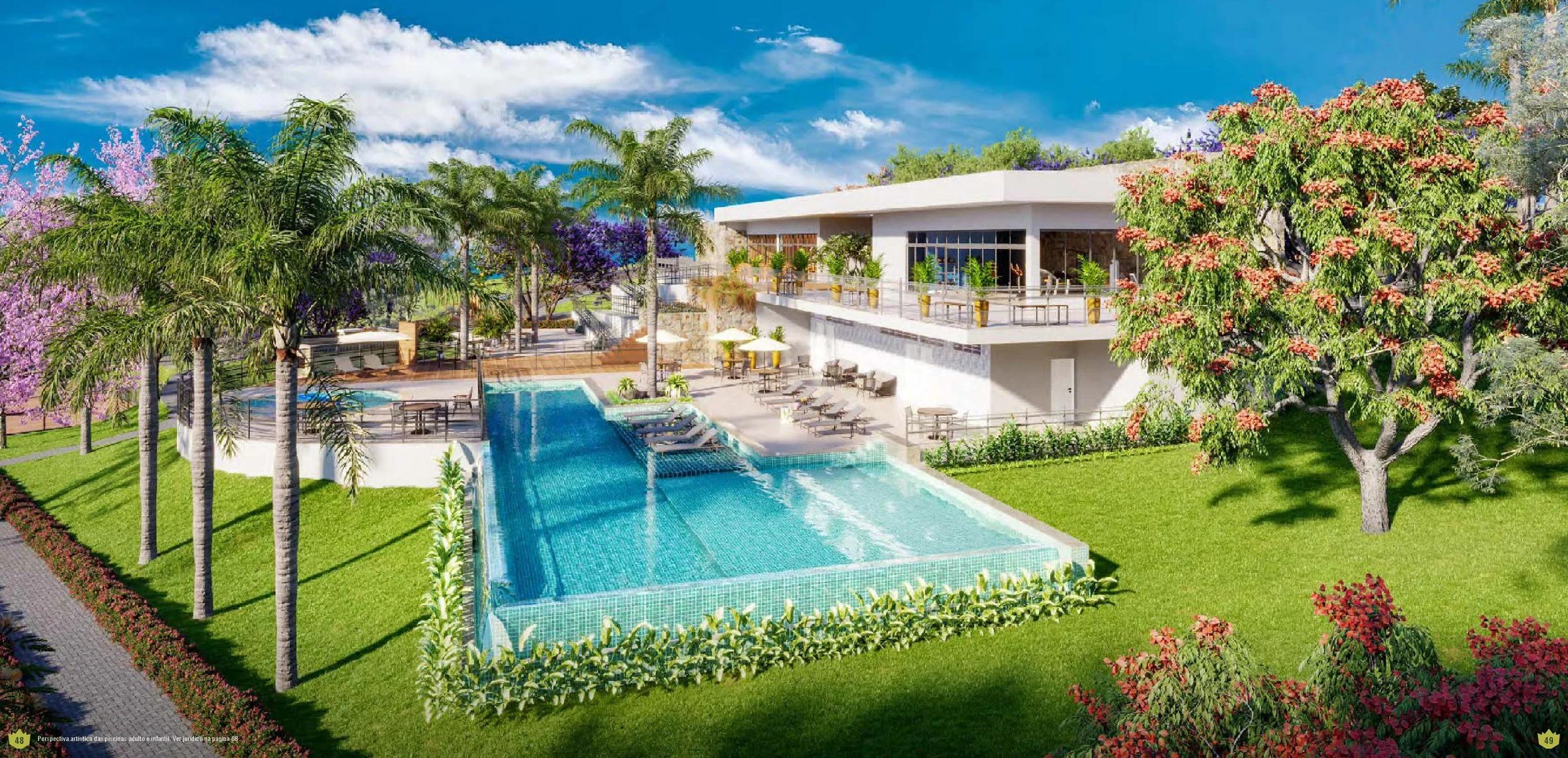 Perspectiva da piscina externa com raia e deck integrado ao edifício do clube