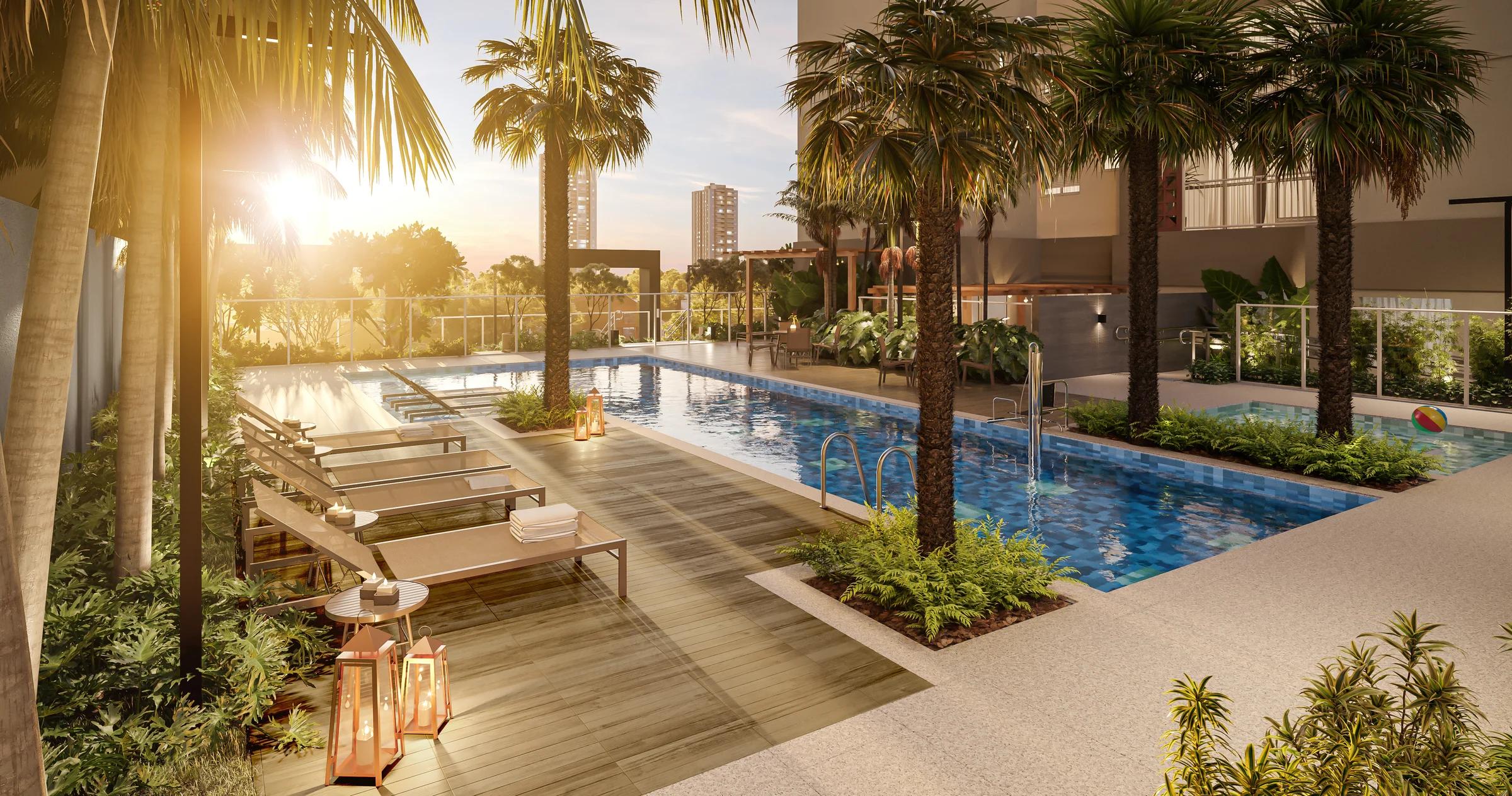 Wish Trinta e Sete - Piscina com deck e palmeiras ao entardecer