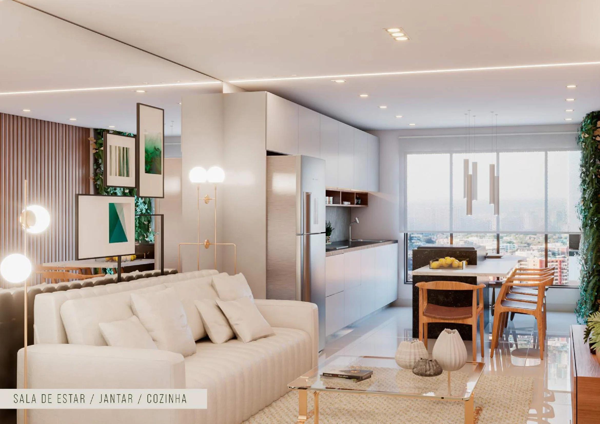 Living integrado com sala de estar, mesa de jantar e cozinha ao fundo