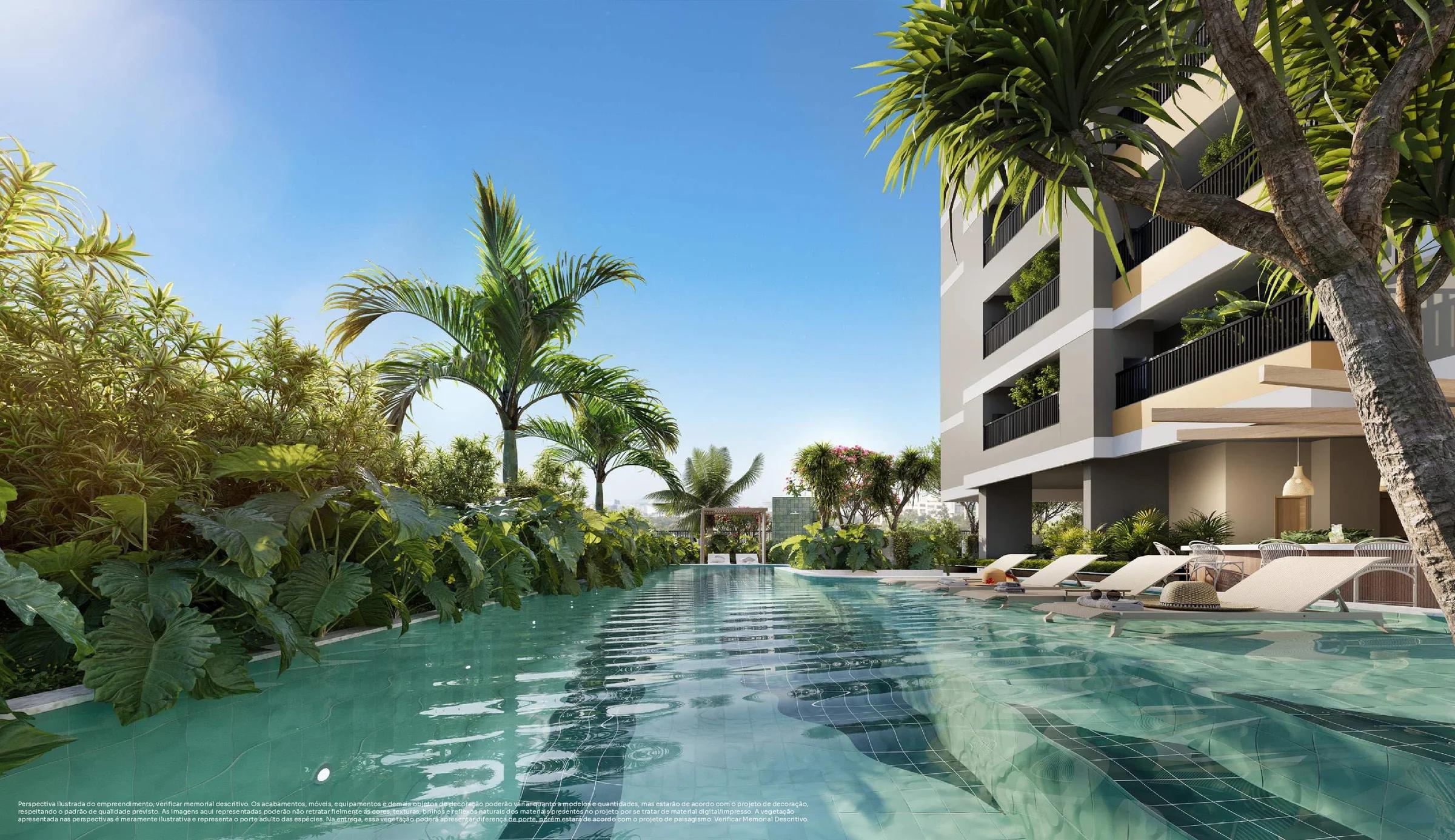Piscina ao ar livre com raia, espreguiçadeiras e jardim lateral