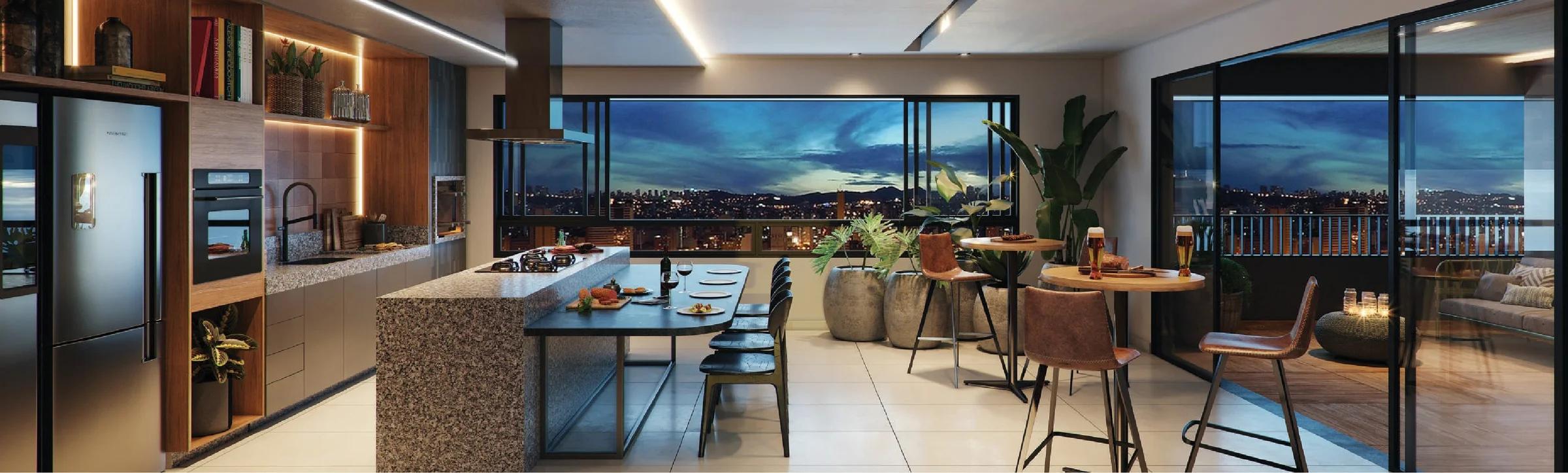 Espaço gourmet do rooftop integrado à varanda com vista panorâmica noturna
