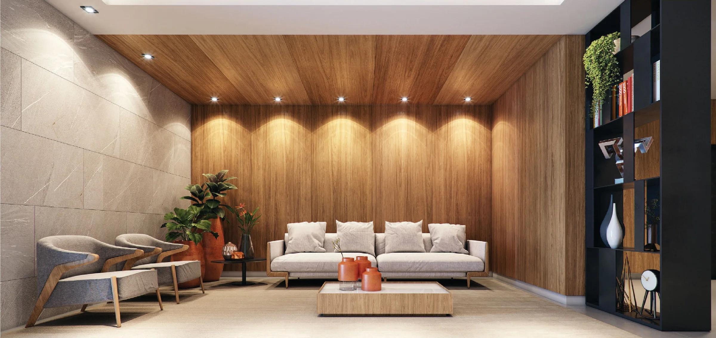 Hall de entrada e recepção com sofás, poltronas, estante divisória e painel de madeira