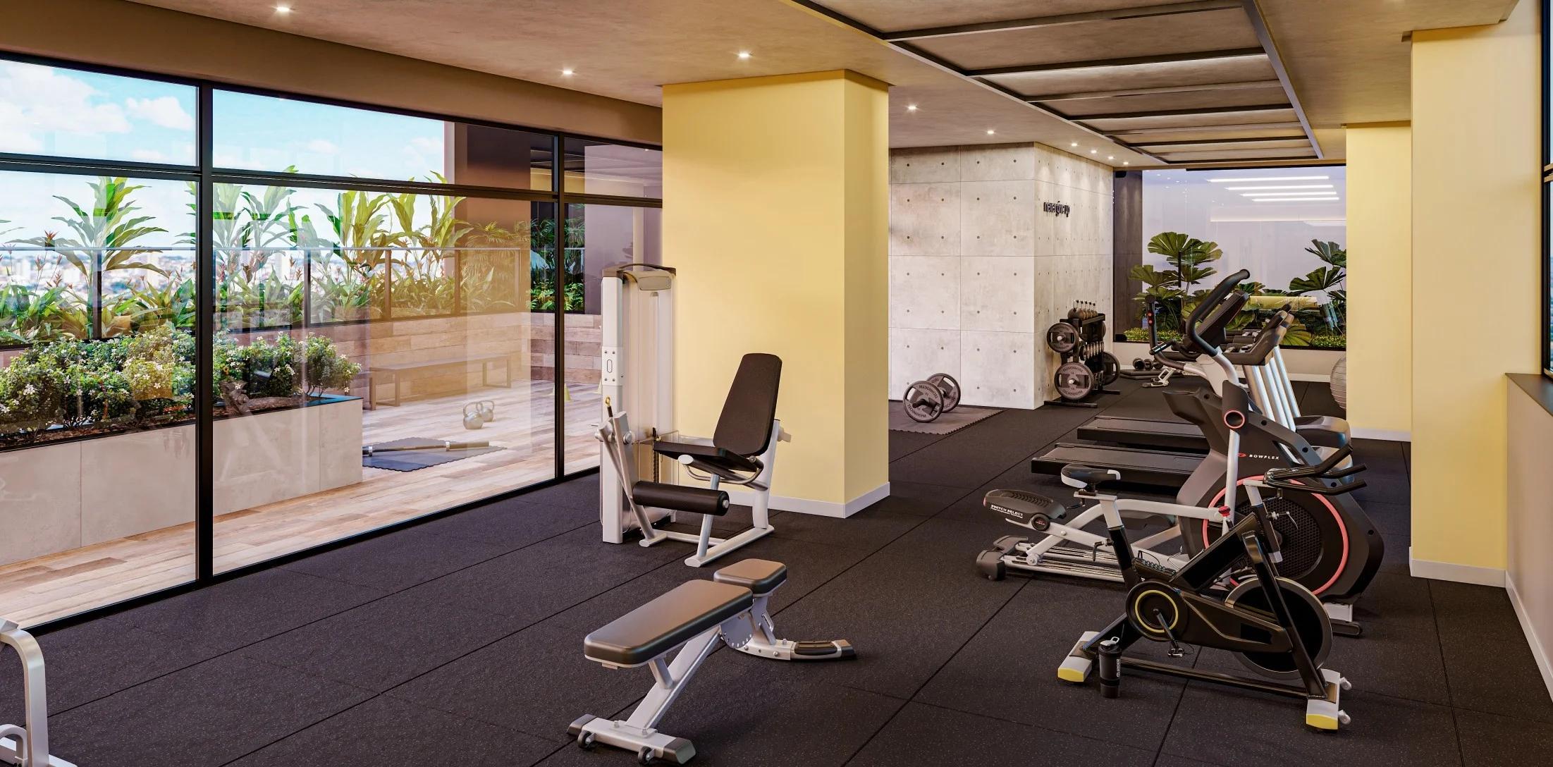 Academia equipada com esteiras, bicicletas e aparelhos de musculação