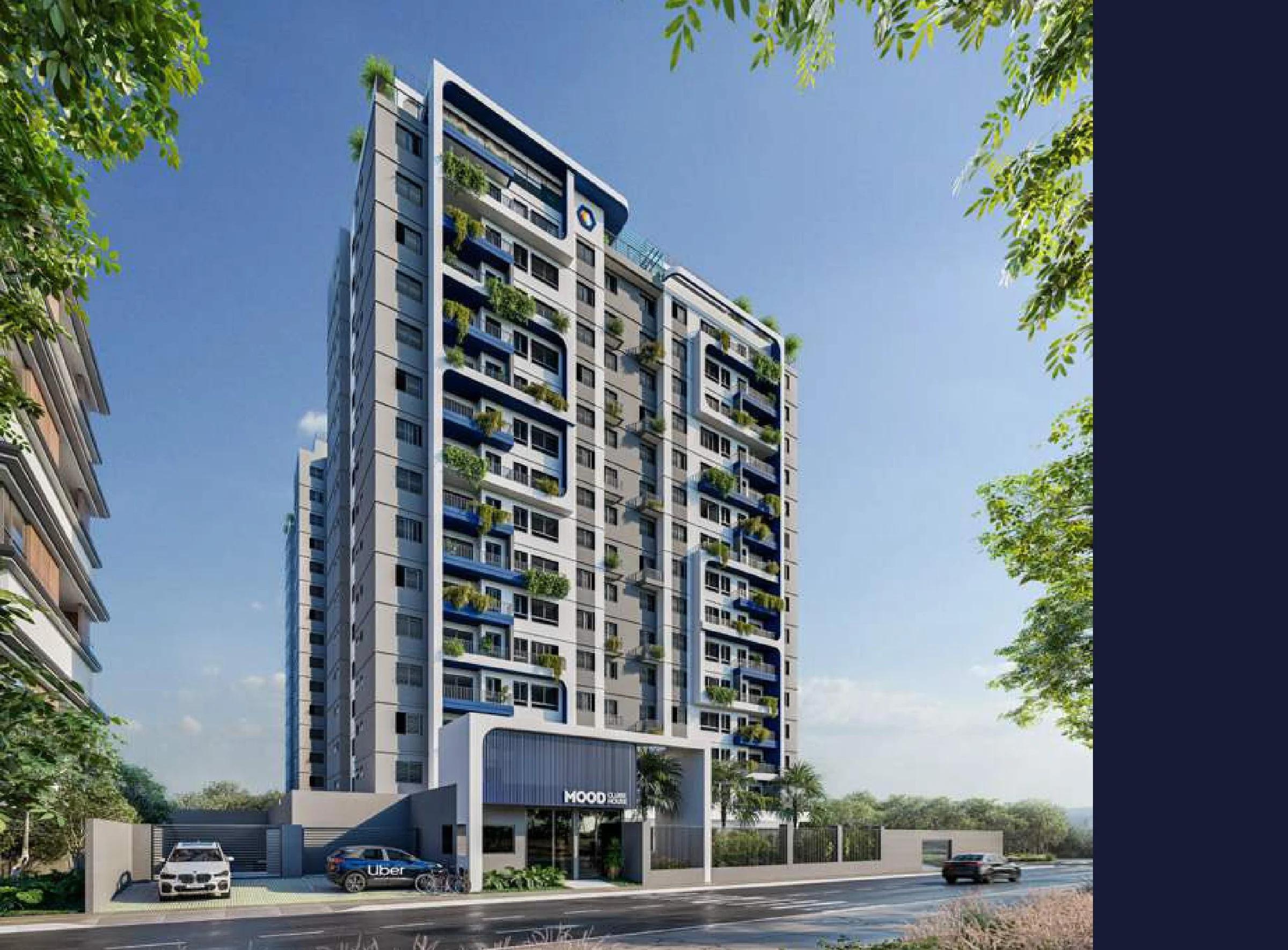 Perspectiva da fachada da torre residencial contemporânea com vegetação nas varandas