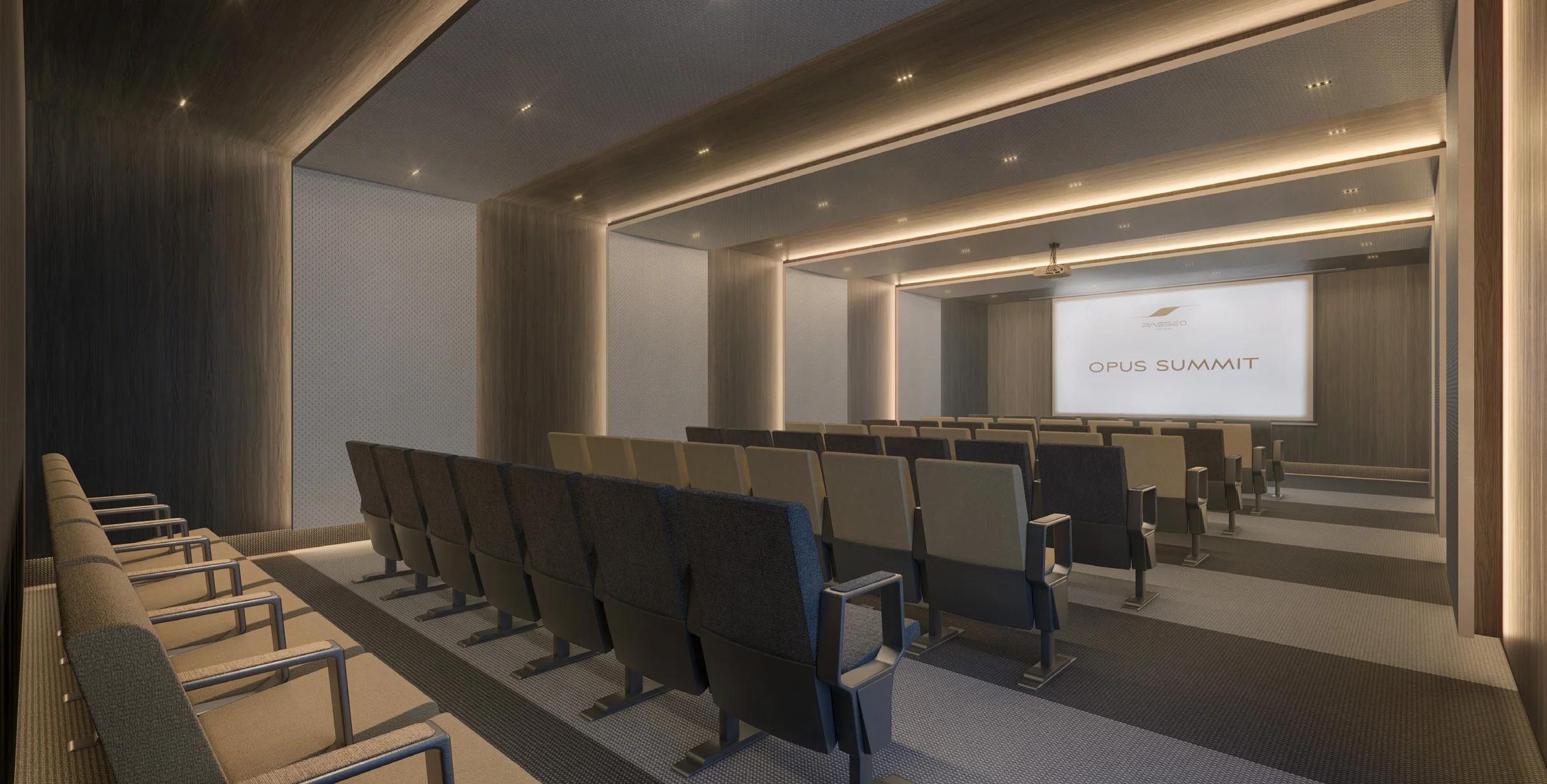 Perspectiva de sala de reunião com fileiras de assentos e tela.