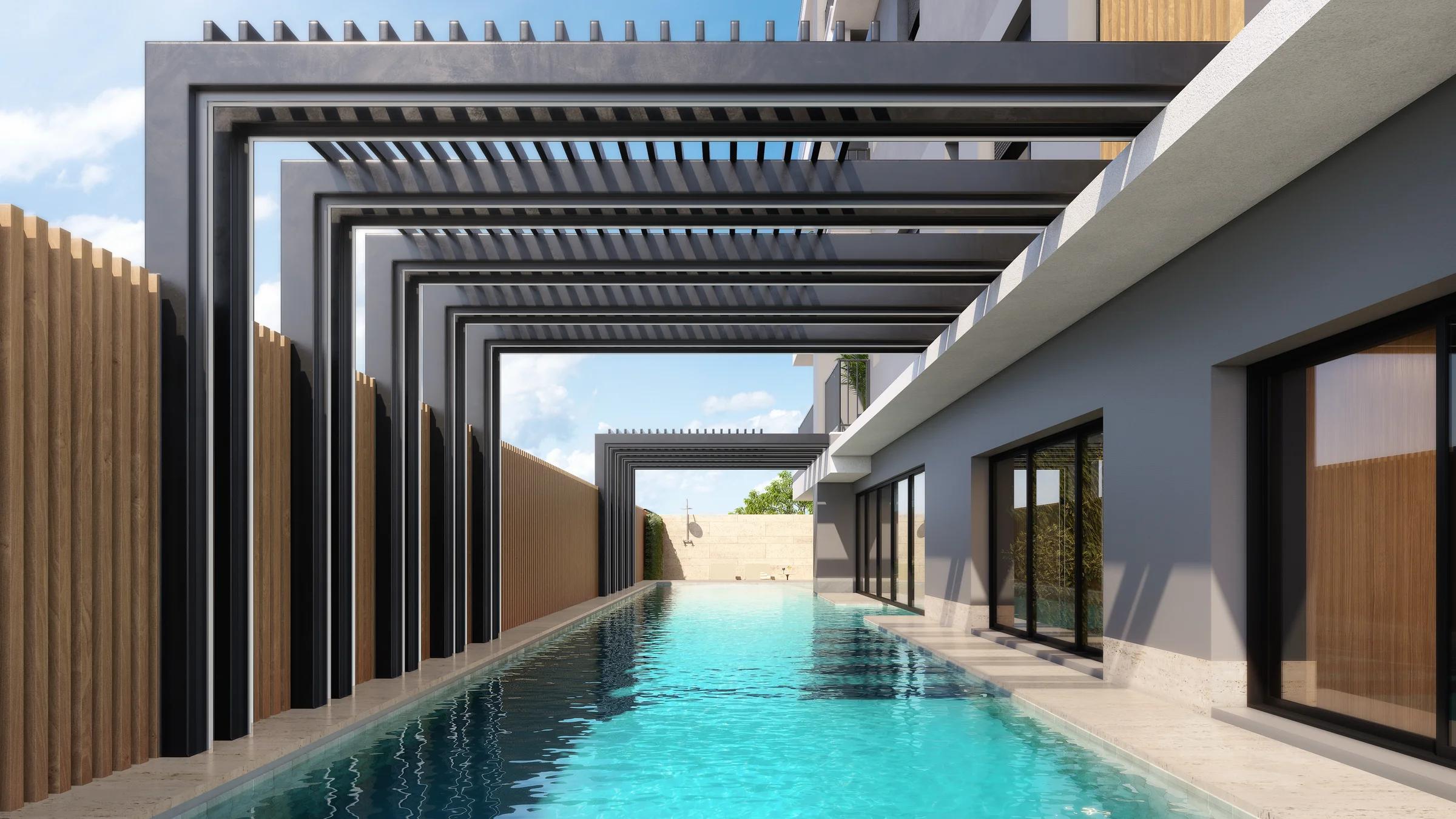 Piscina com raia e estrutura de pergolado metálico contemporâneo.
