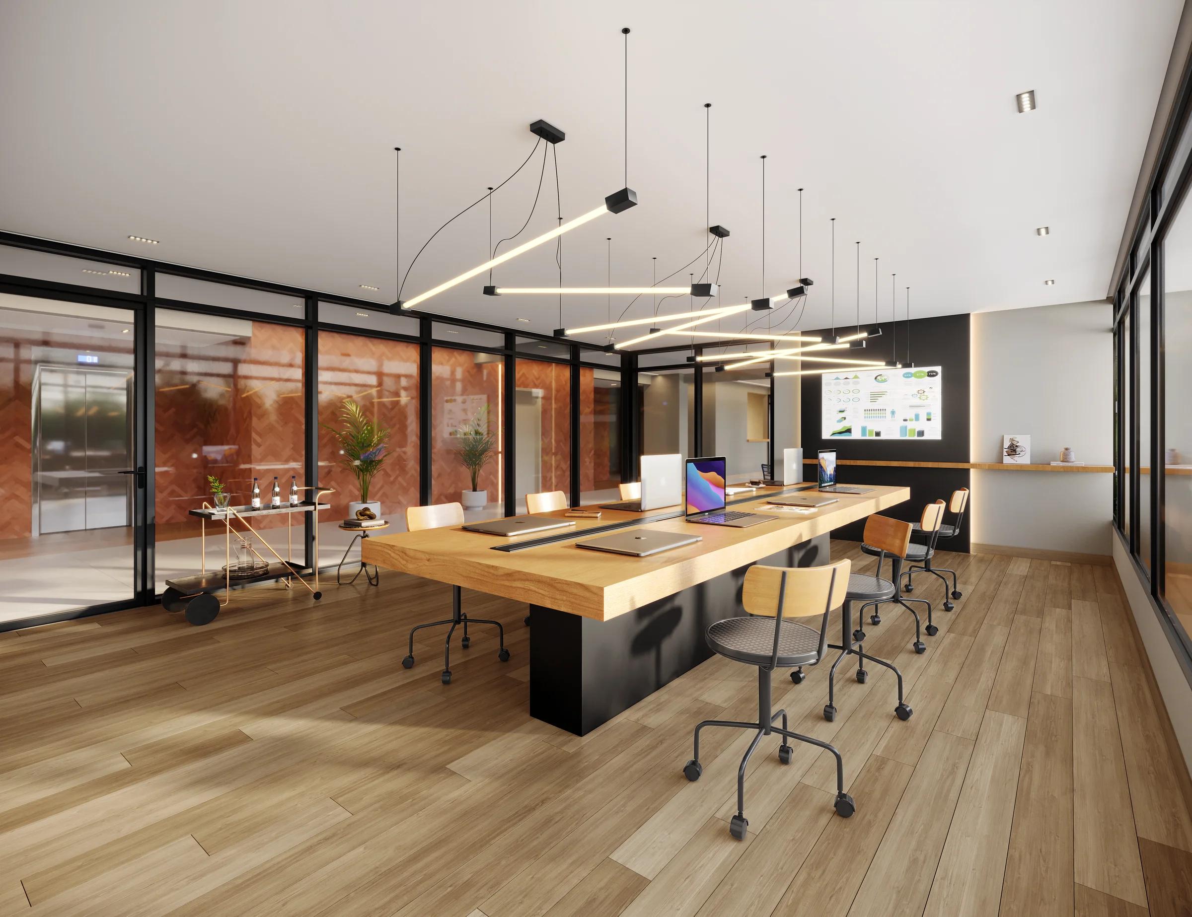Perspectiva de coworking com mesas e estações de trabalho