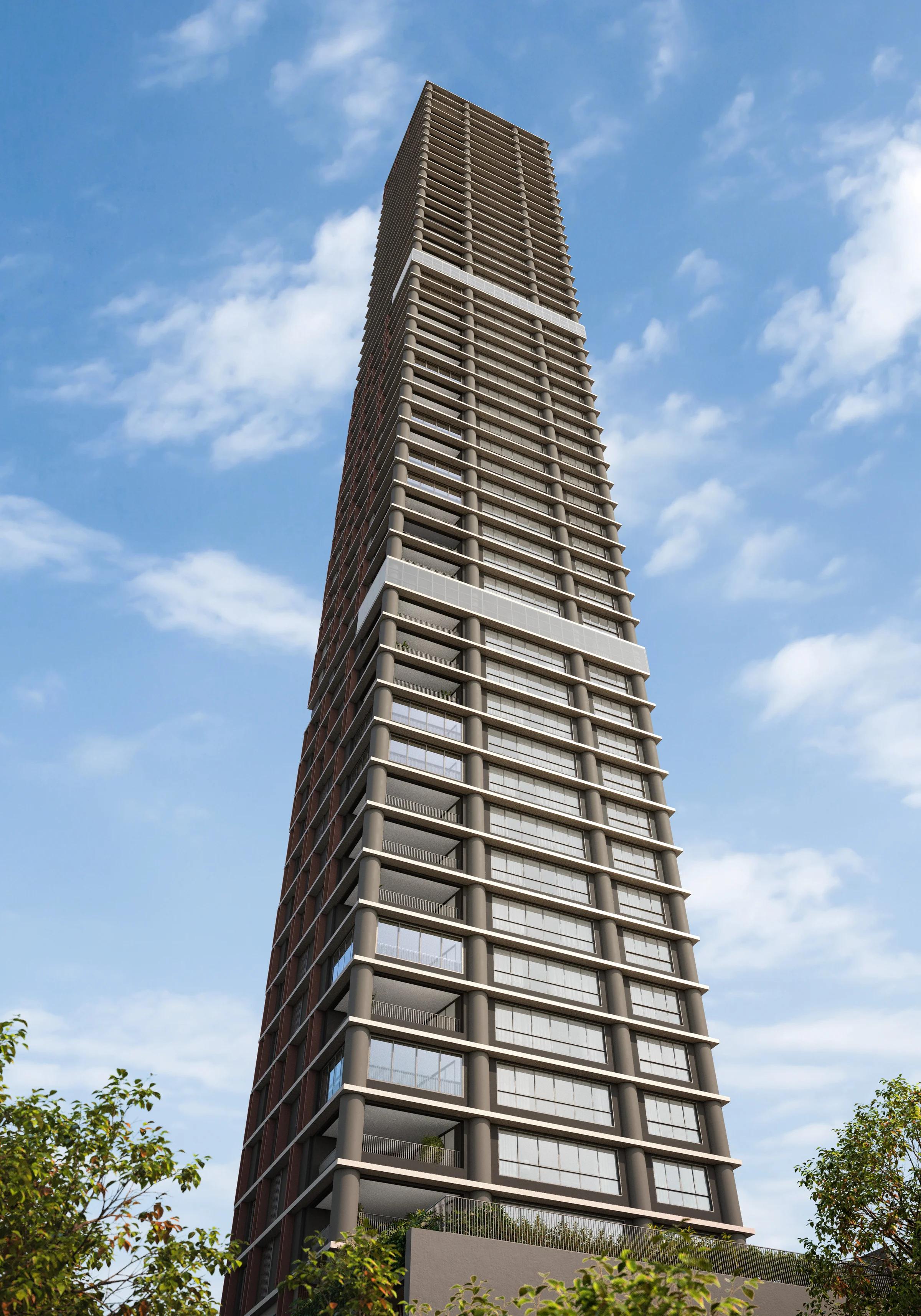 Fachada do edifício vista de baixo para cima destacando a altura e arquitetura