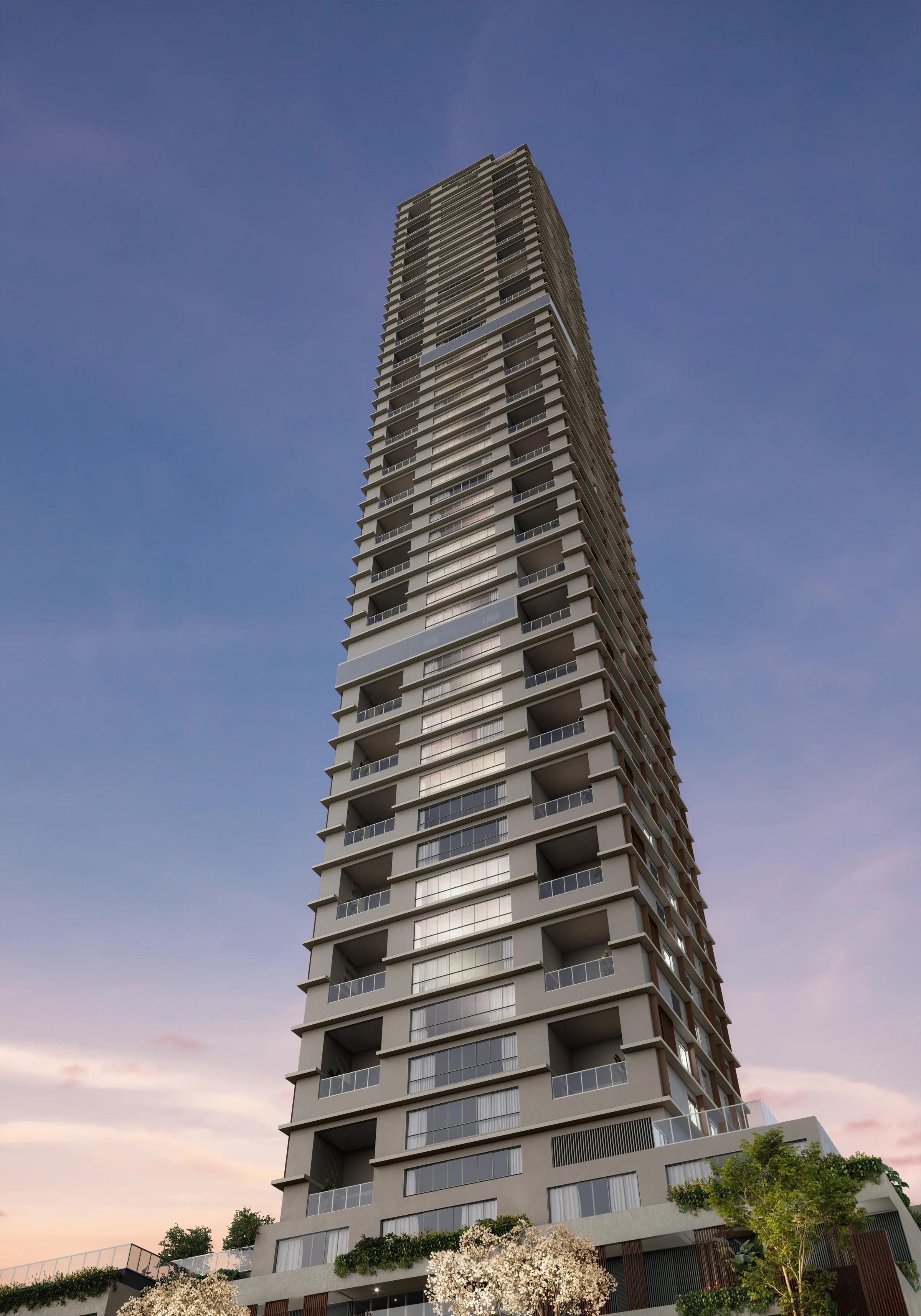 Fachada do edifício vista em ângulo ascendente ao entardecer
