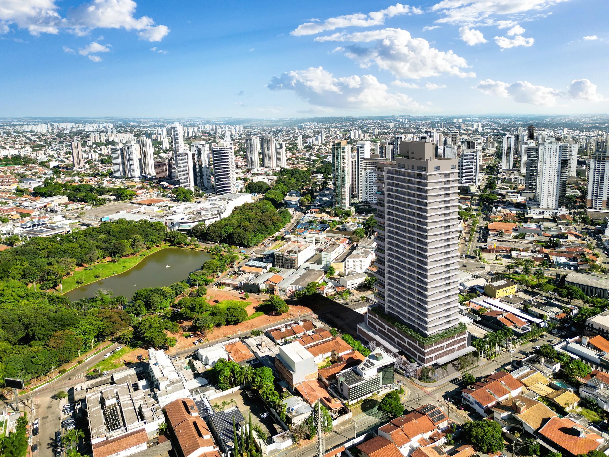 Vista aérea da inserção do empreendimento com lago e parque ao fundo