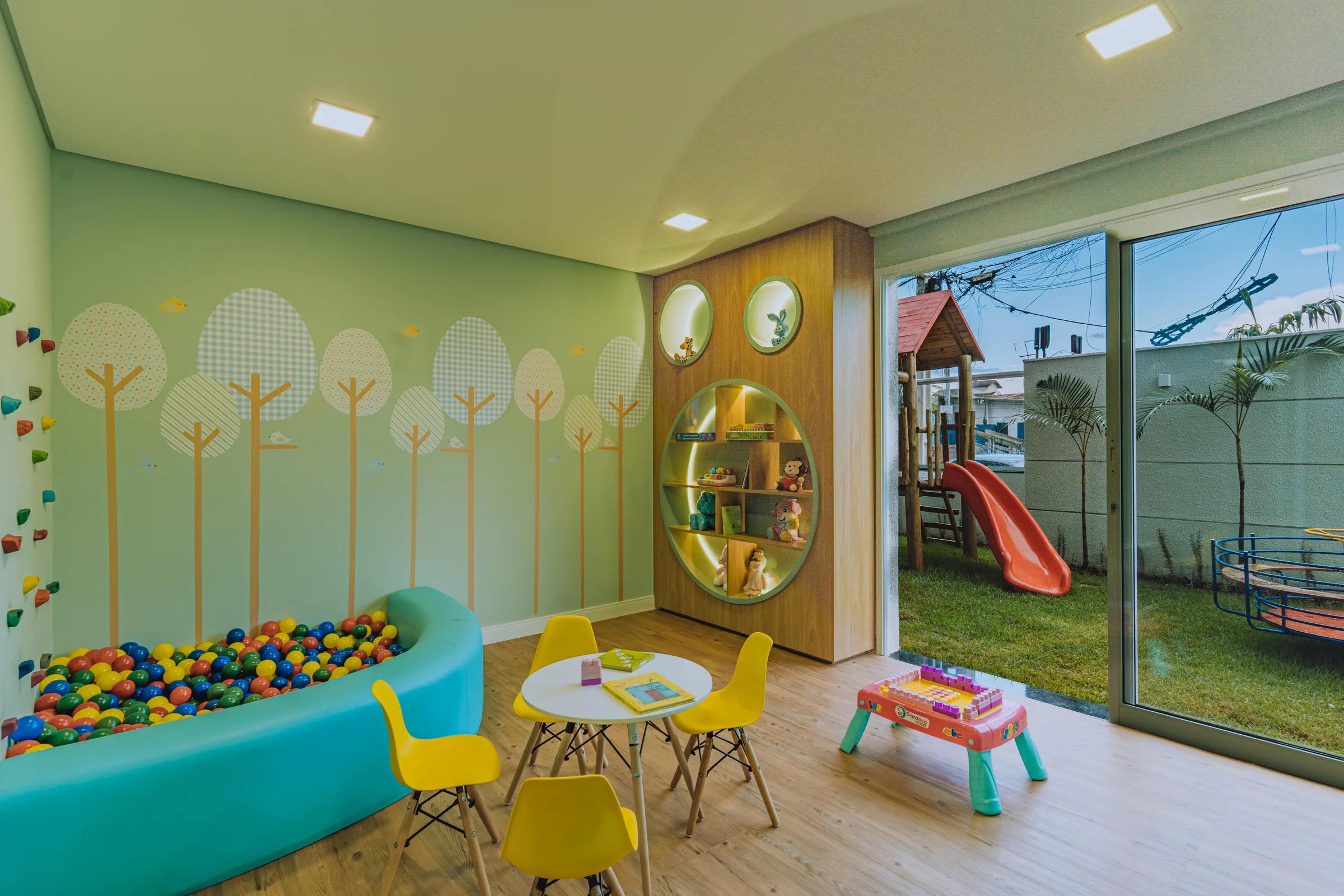 Perspectiva da brinquedoteca com acesso ao playground