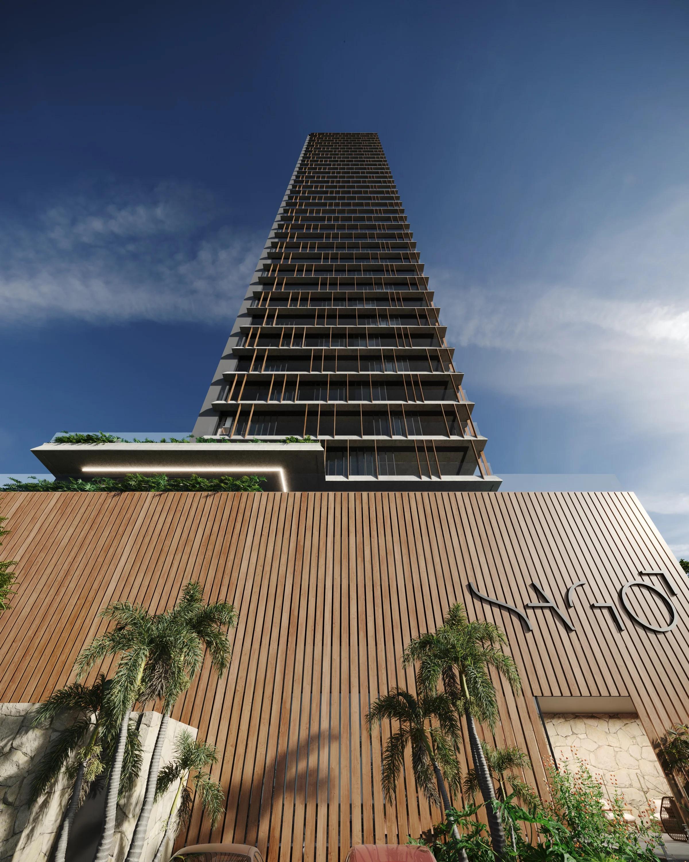 Perspectiva contra-plongée da torre residencial destacando brises e varandas
