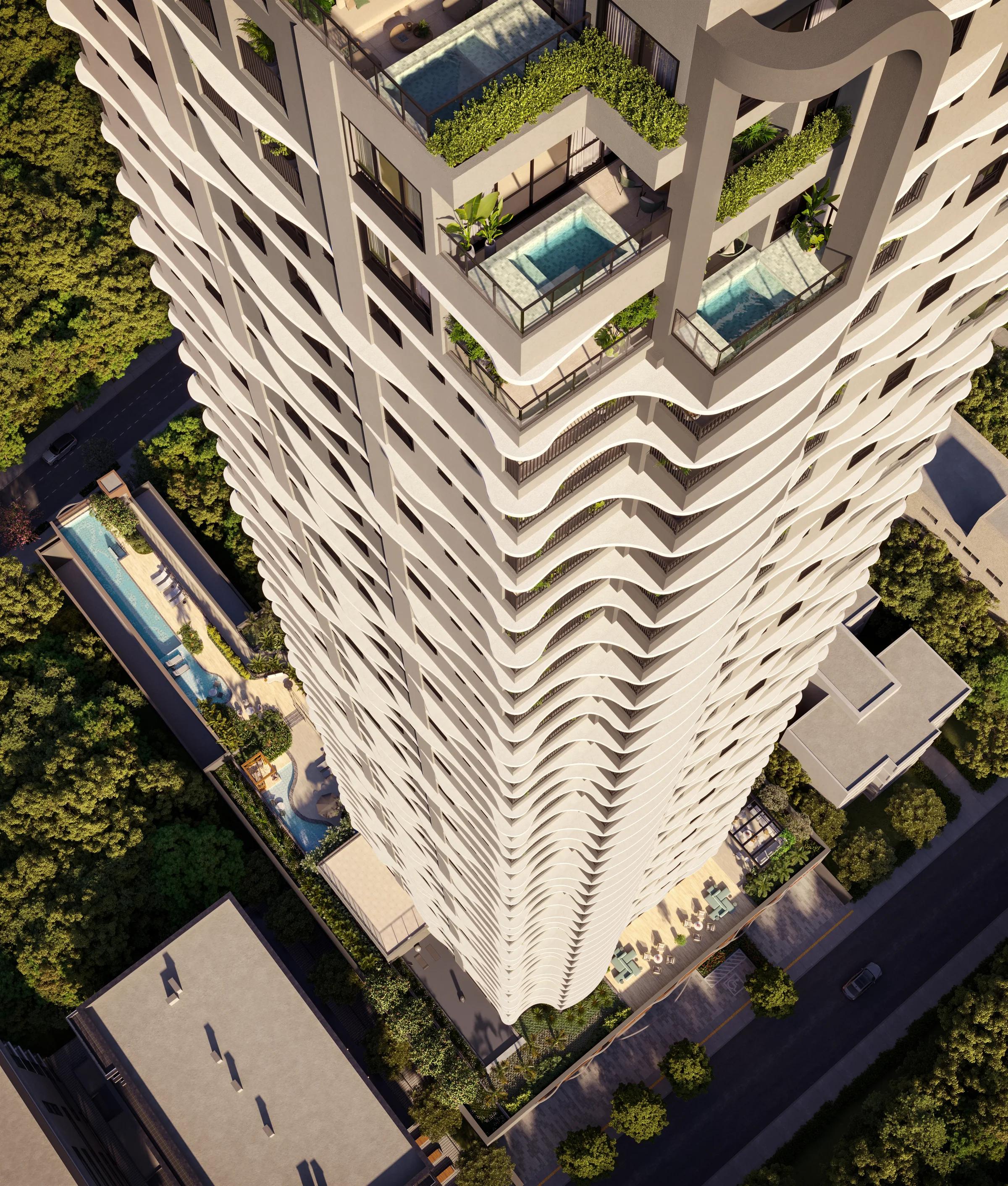 Vista aérea superior do edifício destacando as coberturas com piscinas privativas