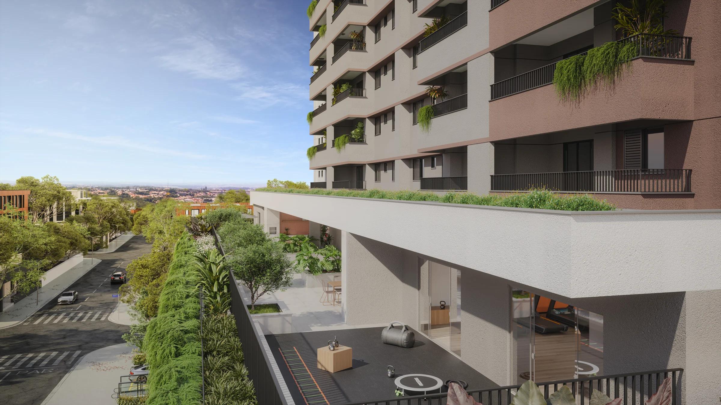 Fachada externa do edifício destacando as varandas e o terraço de lazer com área fitness
