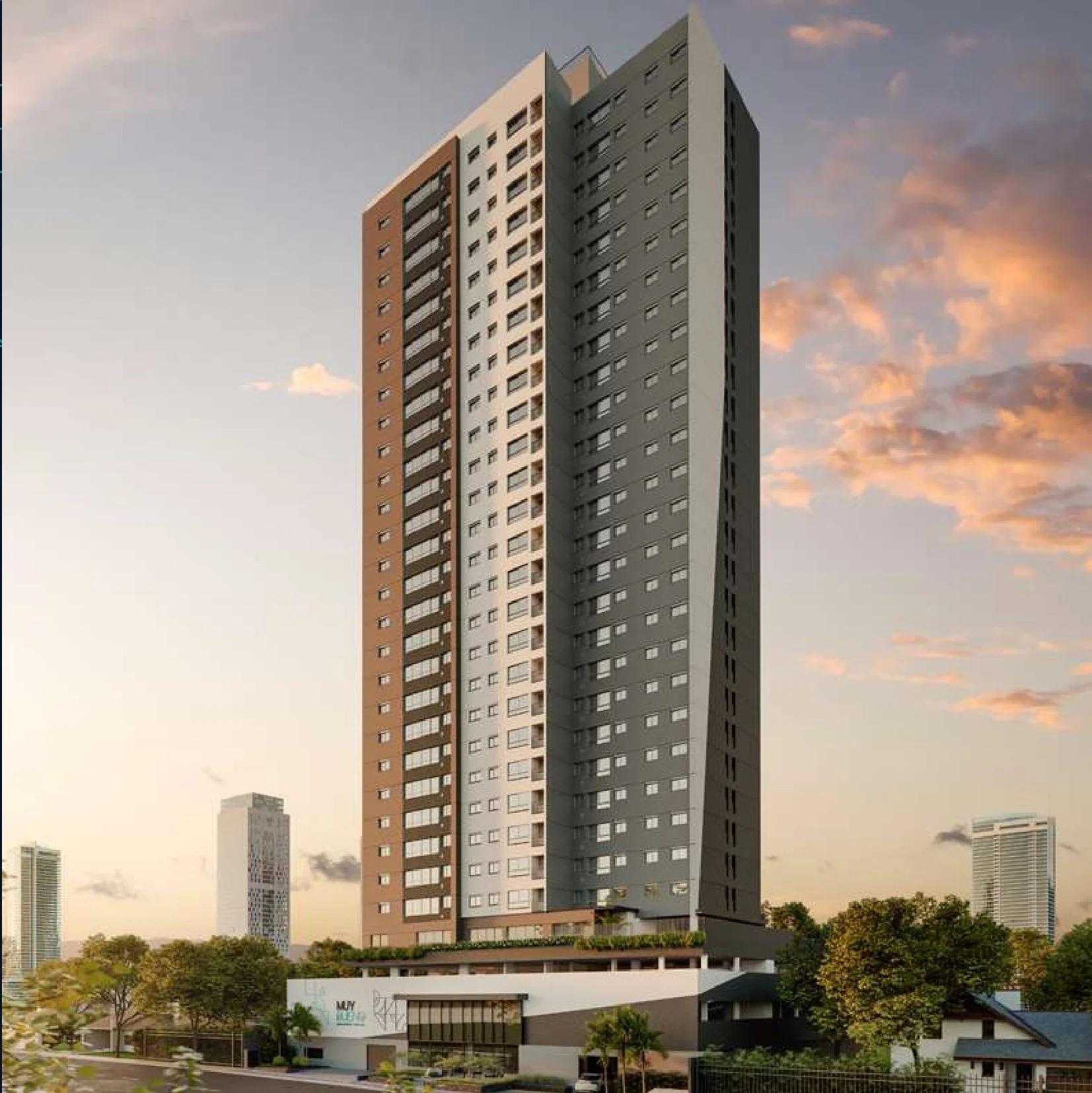 Fachada completa do edifício residencial Muy Bueno em perspectiva vertical ao entardecer