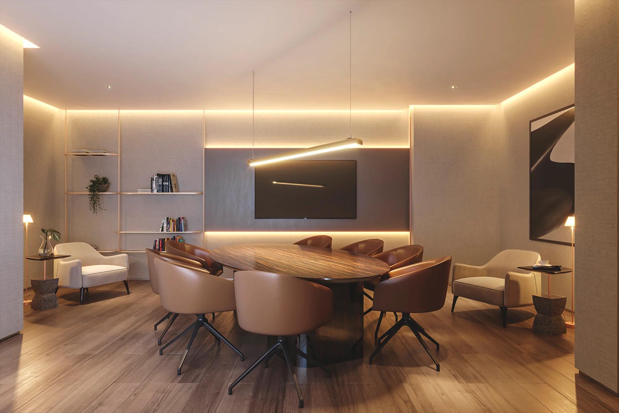 Sala de reuniões do coworking com mesa oval, cadeiras executivas e painel de TV