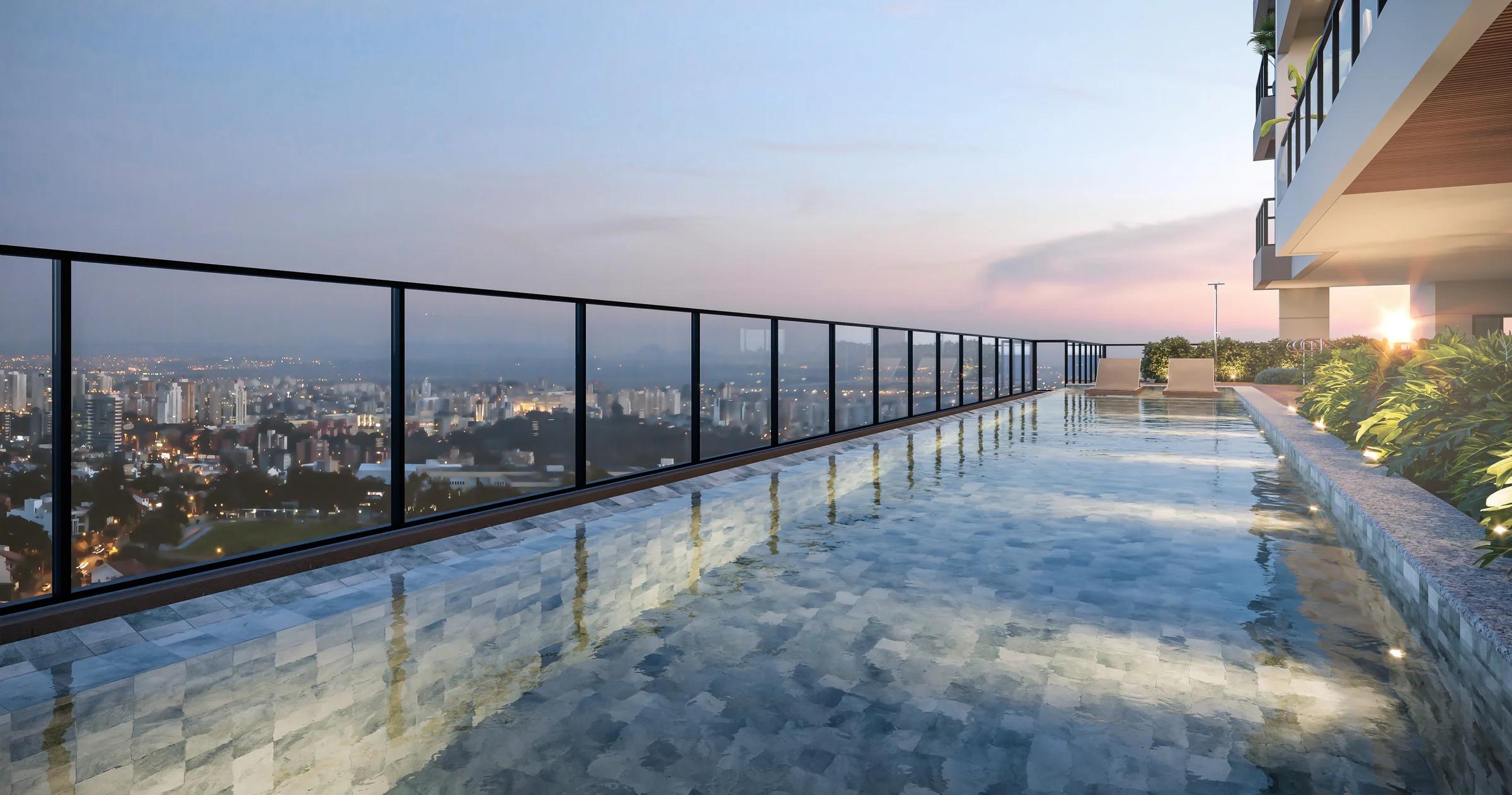Perspectiva da piscina com vista para a cidade
