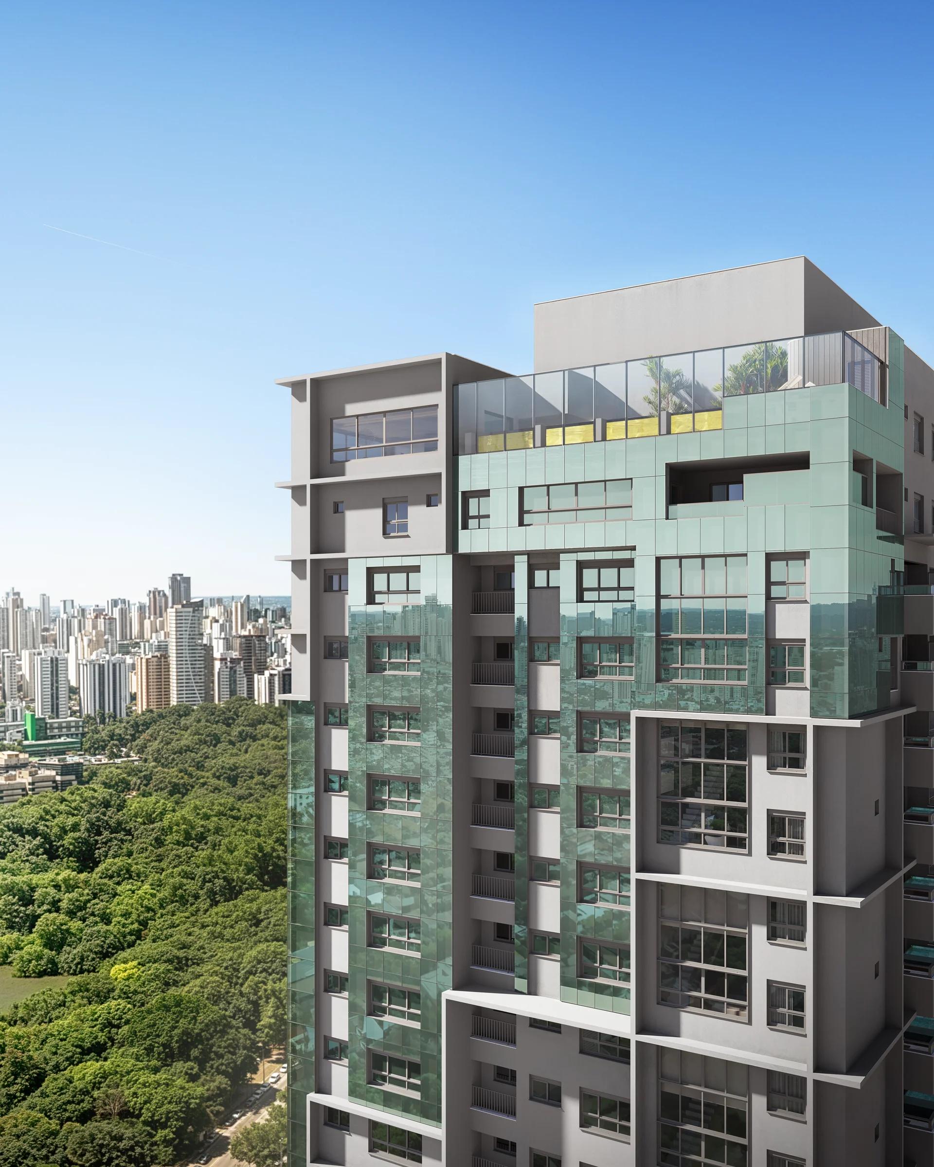 Vista dos pavimentos superiores e rooftop da torre com fachada em vidro verde